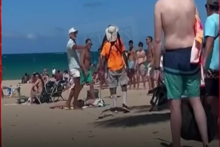 Video: Arrestan conocido vendedor de Pastelillos en playa de Condado por darle a otro con un palo de Golf